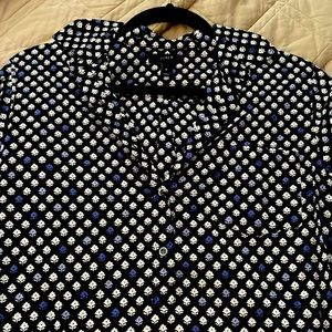 Long sleeve camp shirt, buttons come to about mid chest